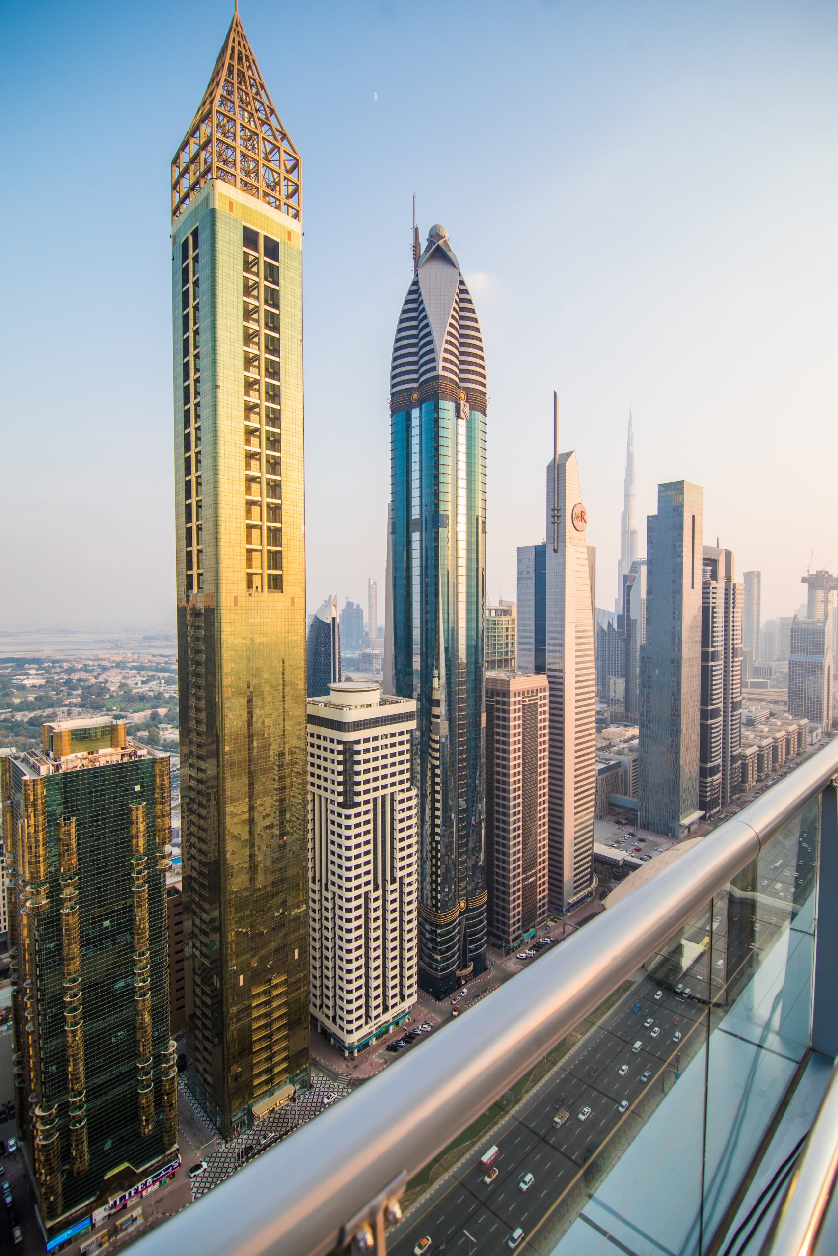 Scenic aerial view downtown Dubai, United Arab Emirates with skyscrapers and highways. Colourful travel background.